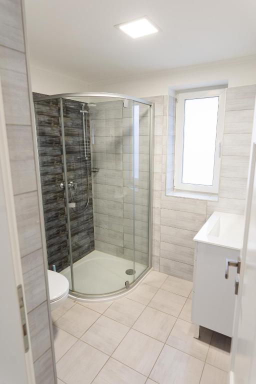 Koupelna v ubytování MYKONOS APARTMAN