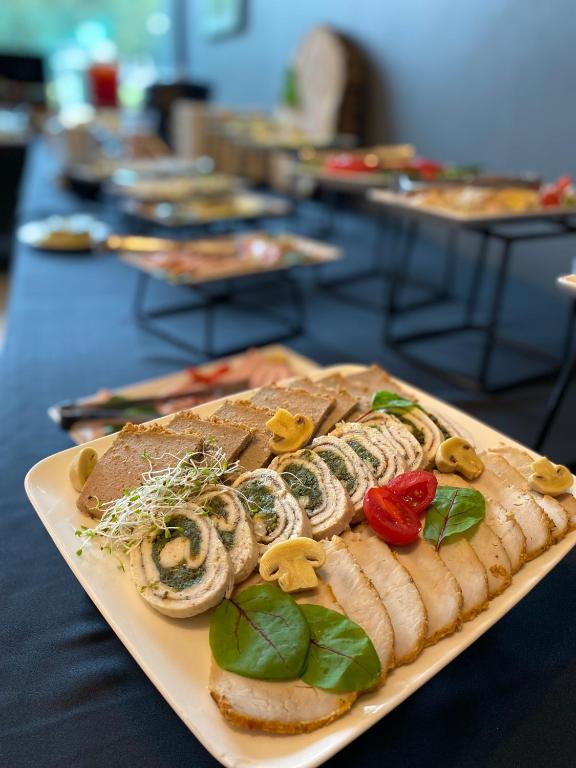 a plate of food sitting on a table at Hotel Galion in Gdańsk