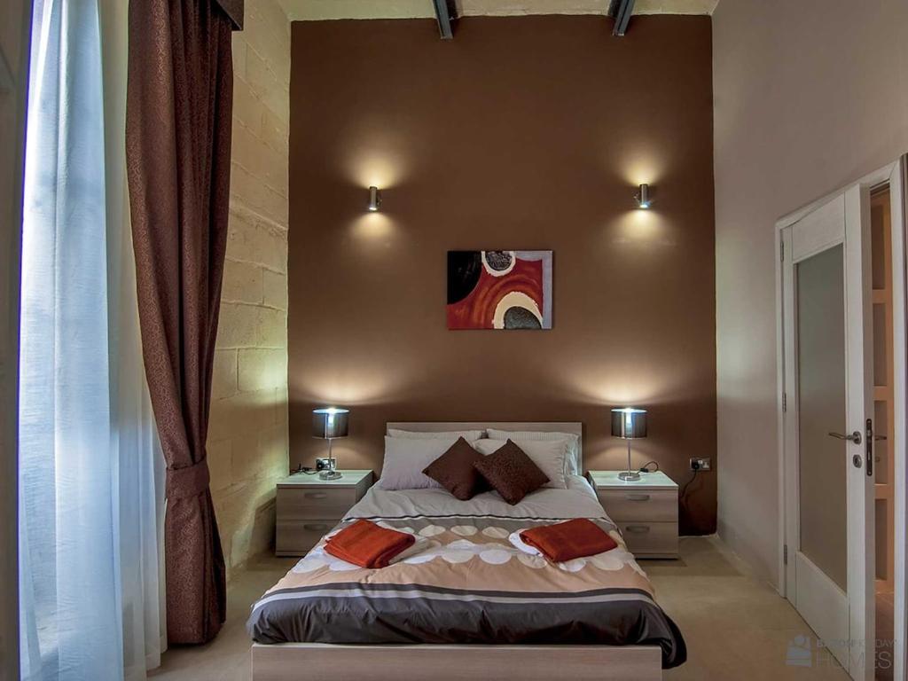 Postel nebo postele na pokoji v ubytování Kampnar Holiday Home