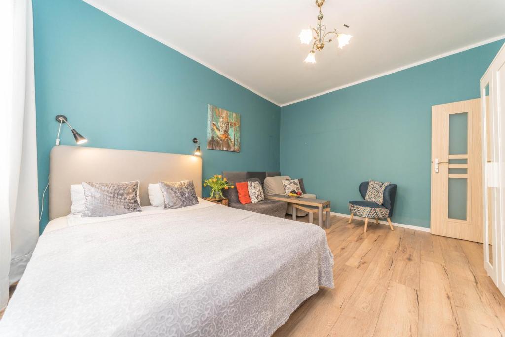 Posteľ alebo postele v izbe v ubytovaní Apartament Przytulny Starówka Old Town Piwna