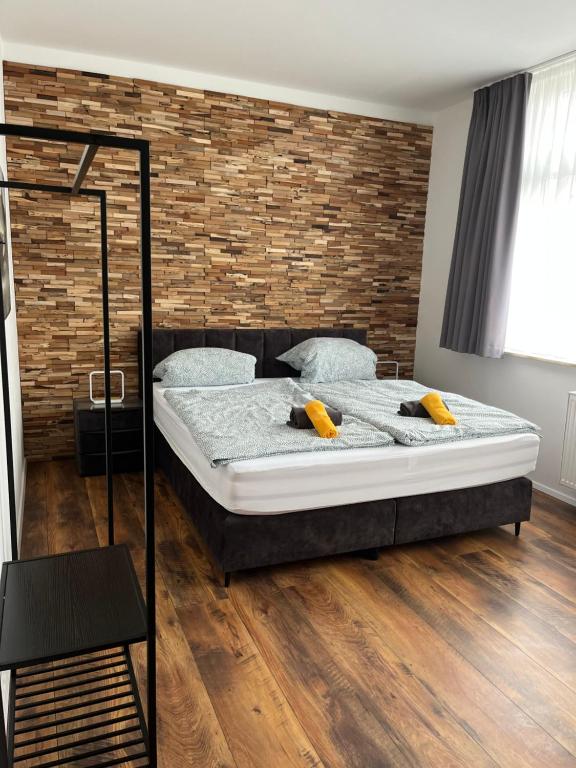 Postel nebo postele na pokoji v ubytování Gästehaus die Erfurter