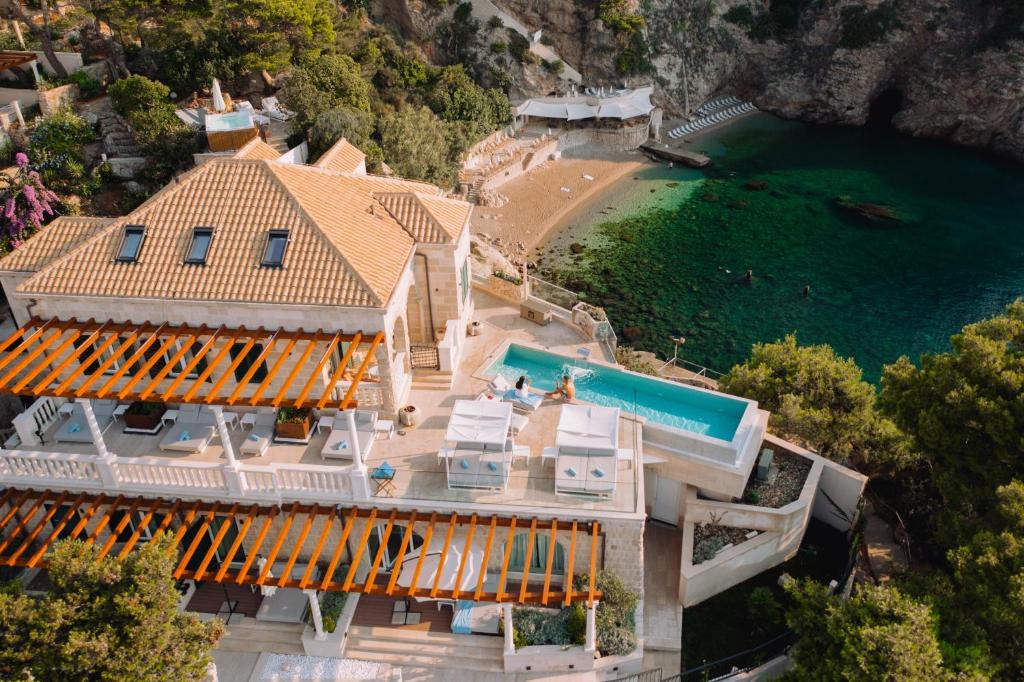 an aerial view of a house with a swimming pool at Villa Orabelle in Dubrovnik