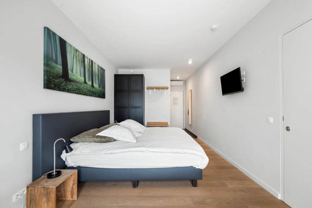 Postel nebo postele na pokoji v ubytování Hotel Kasteelhof 'T Hooghe