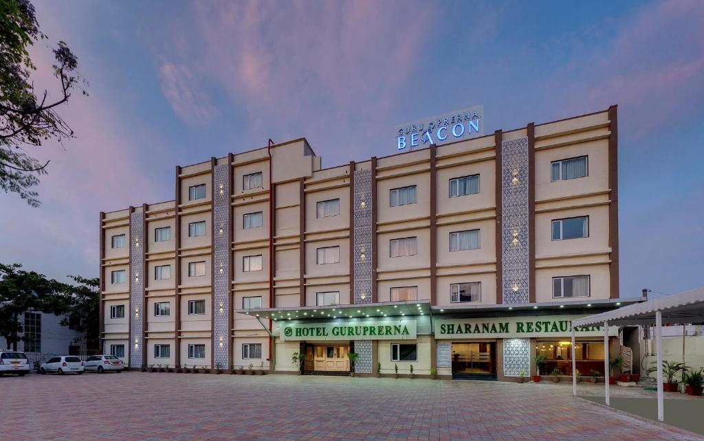 a rendering of the exterior of a hotel at Guruprerna Beacon Resort, Dwarka in Dwarka