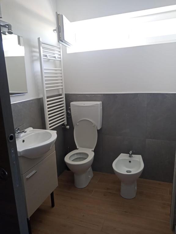 Koupelna v ubytování ALBERGO ELENA 3 via emilia ovest 347