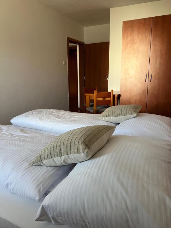Postel nebo postele na pokoji v ubytování Vila Tatra