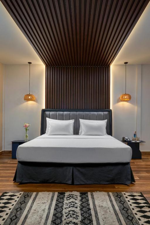 Postel nebo postele na pokoji v ubytování Avataara Resort & Spa