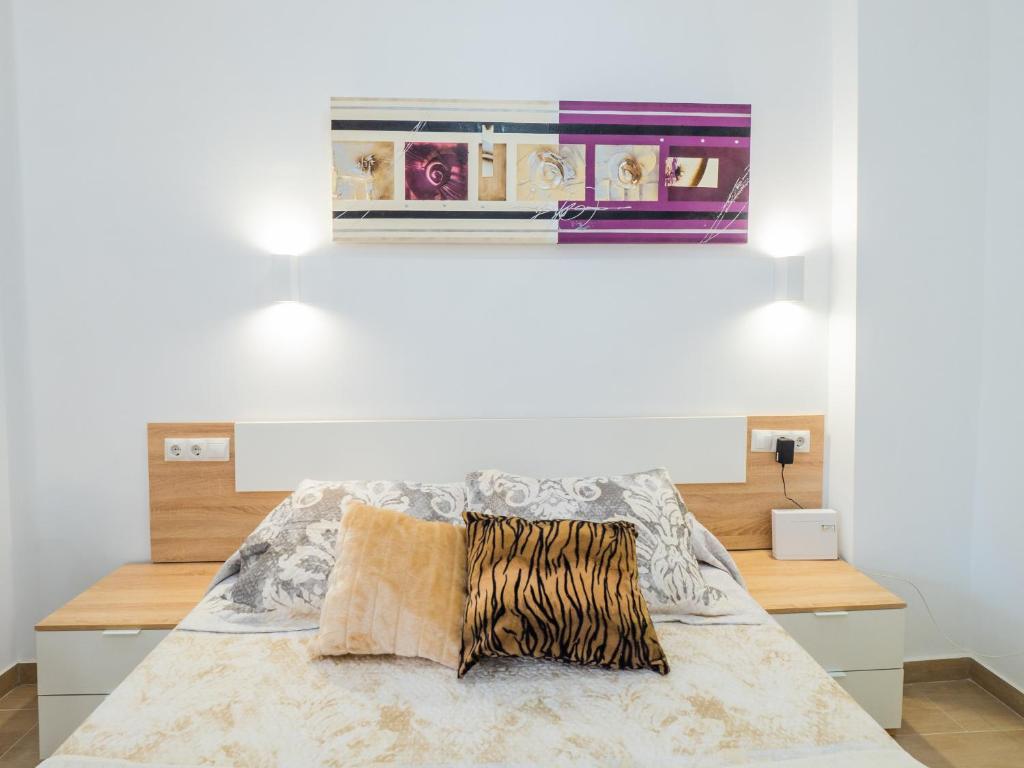 Posteľ alebo postele v izbe v ubytovaní Cubo's Urban Studio Turisbelen