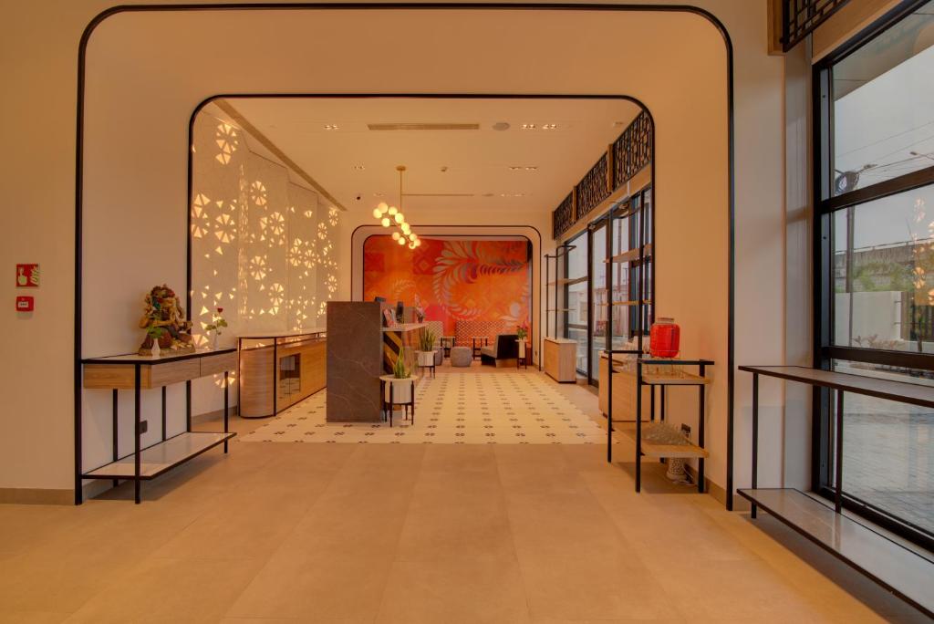 Posezení v ubytování 7 Apple Hotel Nashik