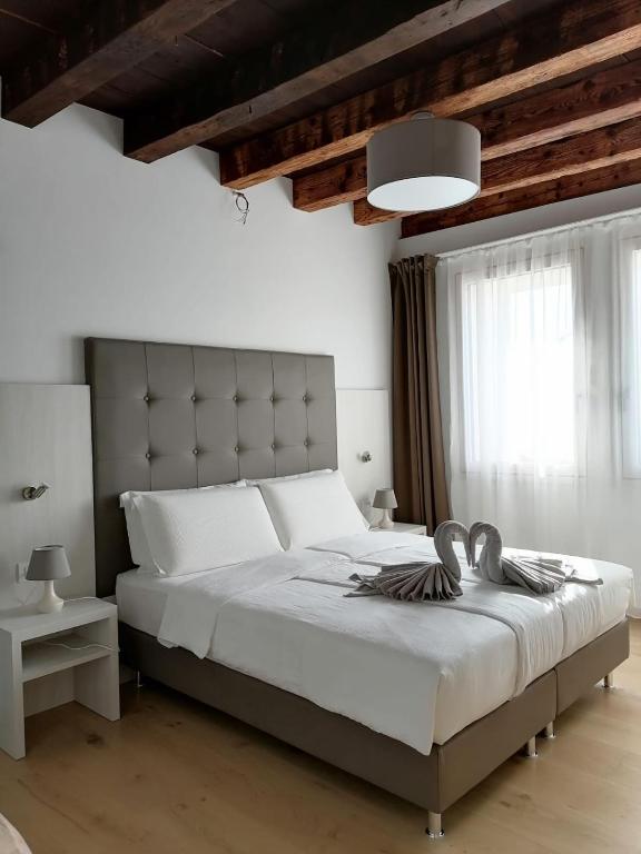 Posteľ alebo postele v izbe v ubytovaní Casa BORRIERO Farmhouse Charme B&B