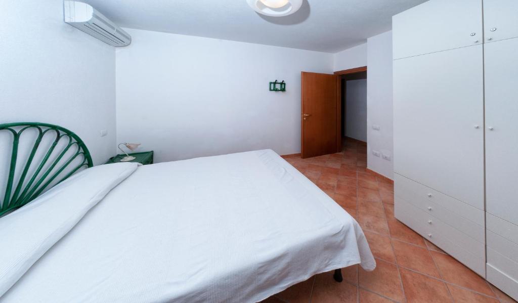 Posteľ alebo postele v izbe v ubytovaní Accogliente appartamento con vista mare