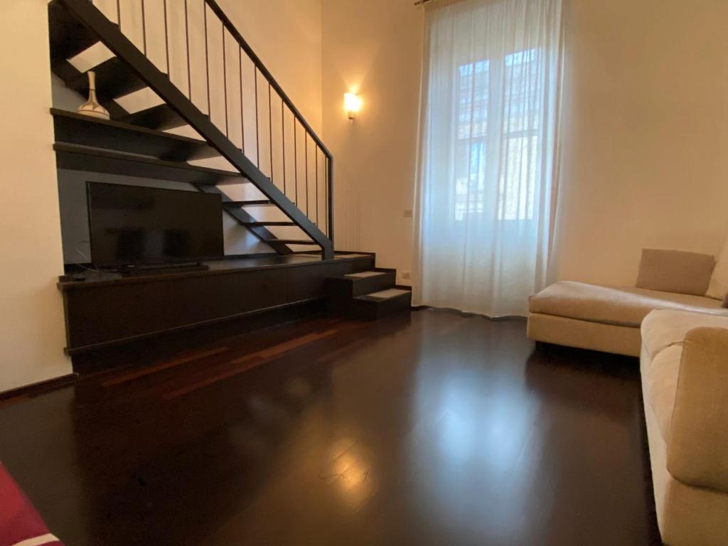A seating area at San Giovanni Lovely Loft