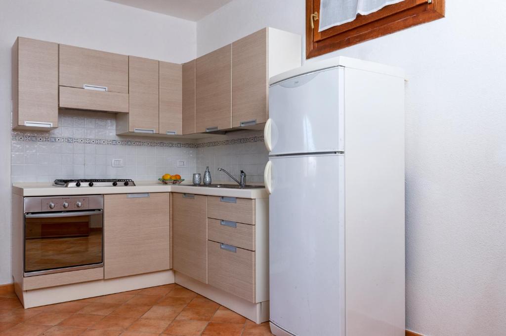 Kuchyňa alebo kuchynka v ubytovaní Accogliente appartamento con vista mare