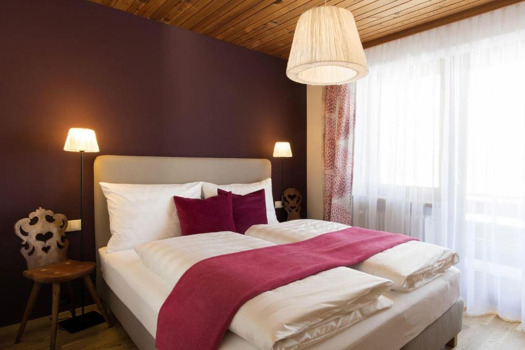 Postel nebo postele na pokoji v ubytování Ferienhaus Alpavera
