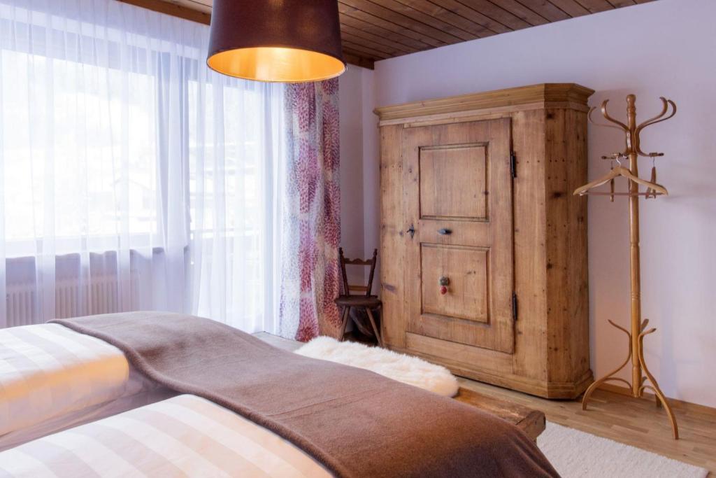 Postel nebo postele na pokoji v ubytování Ferienhaus Alpavera