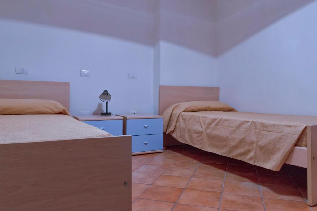 Posteľ alebo postele v izbe v ubytovaní Accogliente appartamento con vista mare