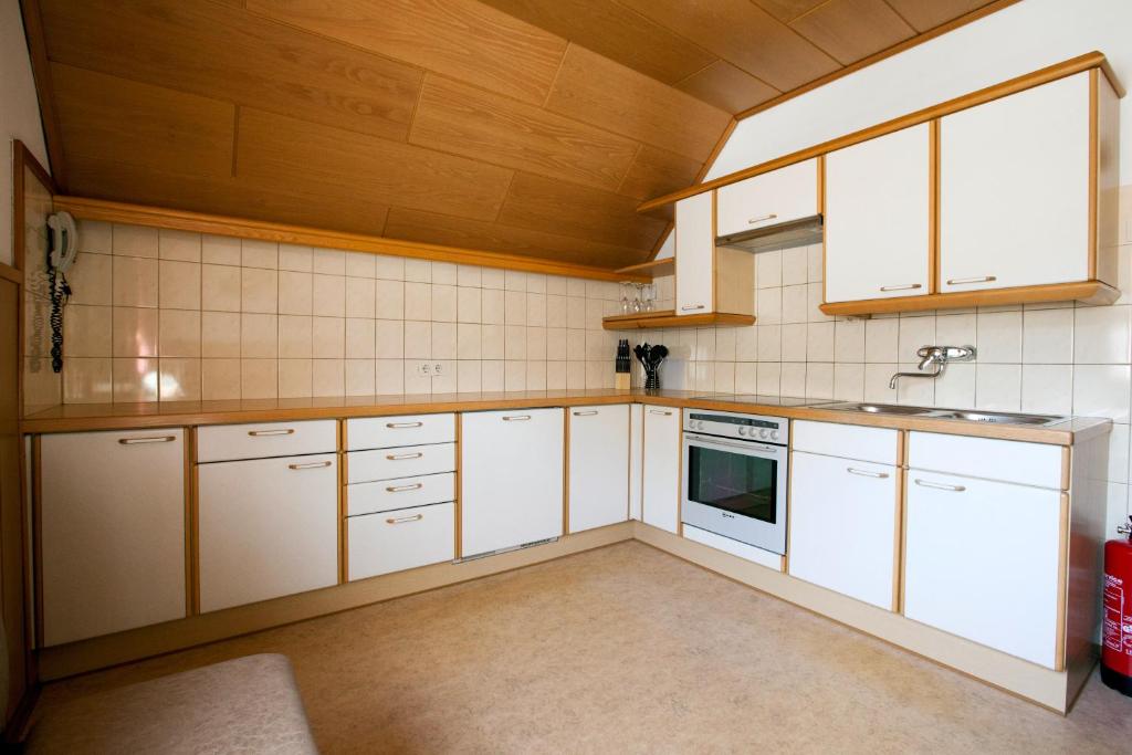 Kuchyň nebo kuchyňský kout v ubytování Hotel Bergkristall
