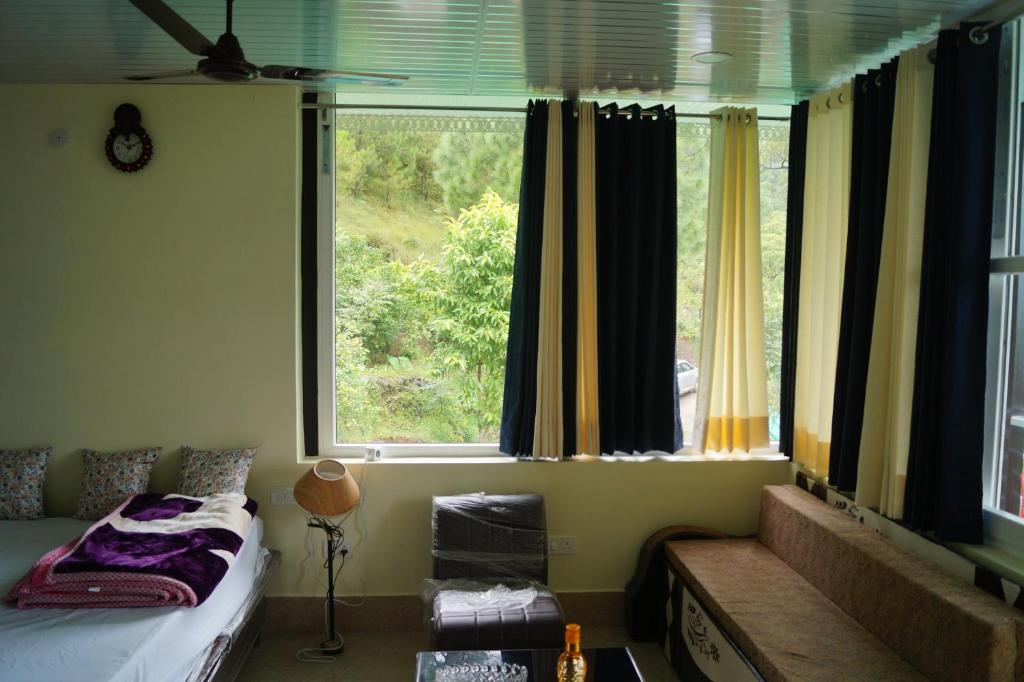 Postel nebo postele na pokoji v ubytování Patial Home Stay
