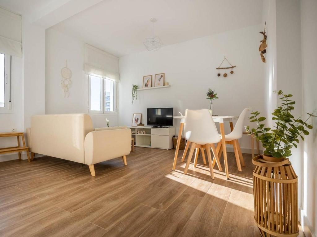 Televízia a/alebo spoločenská miestnosť v ubytovaní Gran plaza home - Vacacional Sevilla