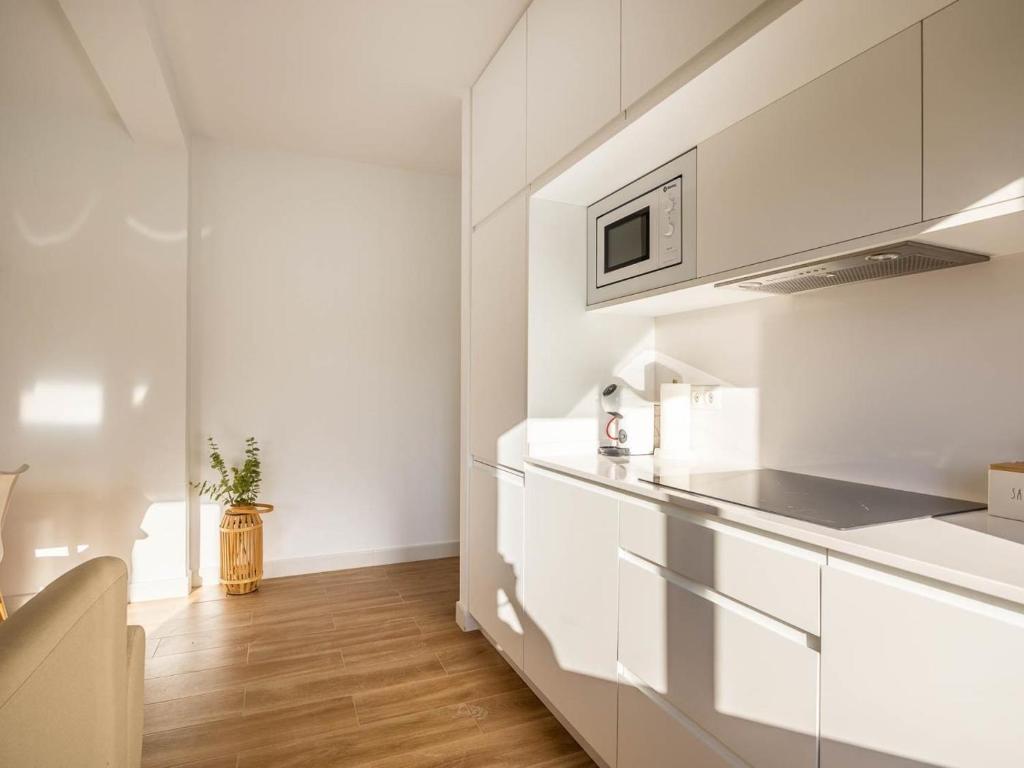 Kuchyňa alebo kuchynka v ubytovaní Gran plaza home - Vacacional Sevilla
