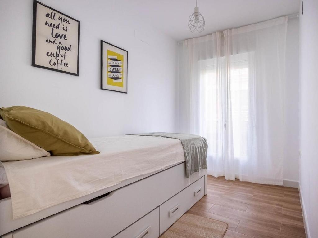 Posteľ alebo postele v izbe v ubytovaní Gran plaza home - Vacacional Sevilla