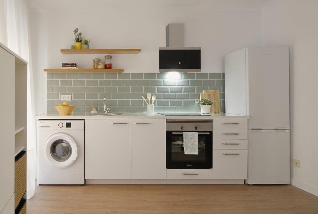 Kuchyň nebo kuchyňský kout v ubytování 155A - Apartamento junto al Puerto Deportivo Gijón