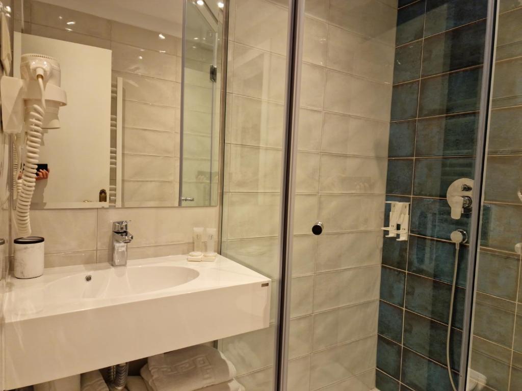 Koupelna v ubytování Hotel Caraiman