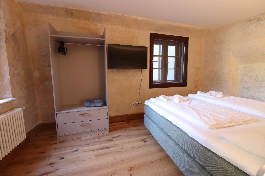Postel nebo postele na pokoji v ubytování Das Fischer Boardinghouse KF