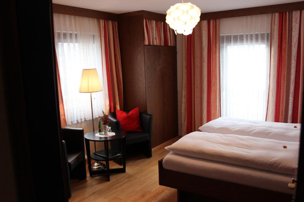 Postel nebo postele na pokoji v ubytování Pension Wolfgangsee