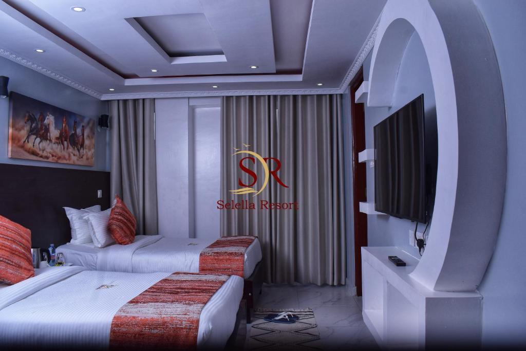 Postel nebo postele na pokoji v ubytování Selella Resort