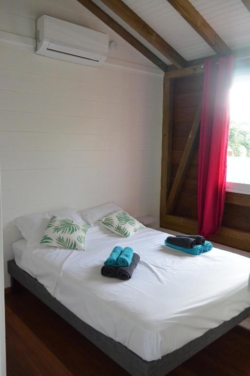 Postel nebo postele na pokoji v ubytování Maison Piscine personnelle vue mer COSY