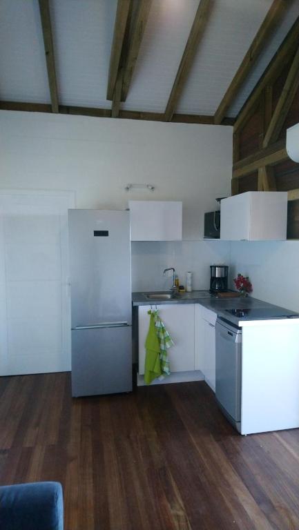 Kuchyň nebo kuchyňský kout v ubytování Maison Piscine personnelle vue mer COSY