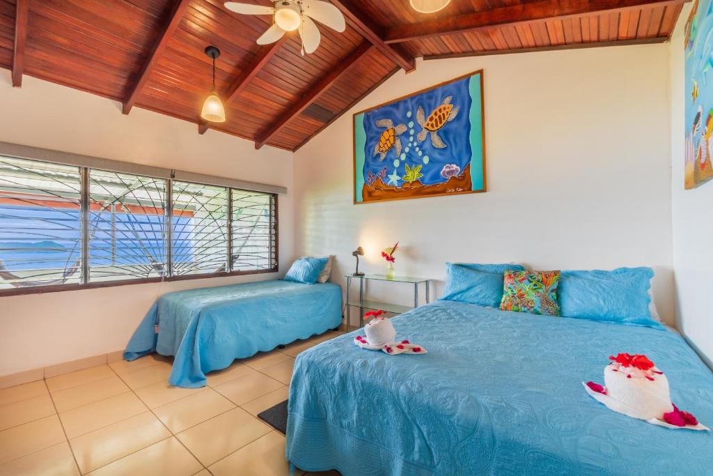 Postel nebo postele na pokoji v ubytování Hotel Villas de la Selva