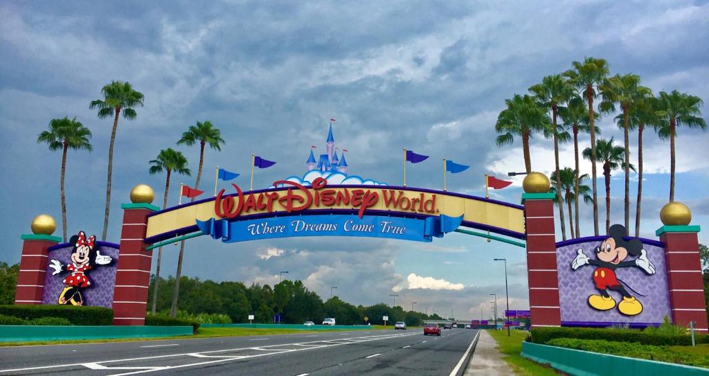 a sign for the entrance to a disney world theme park at Tipsy Turtle Direct Oceanfront in Palm Coast