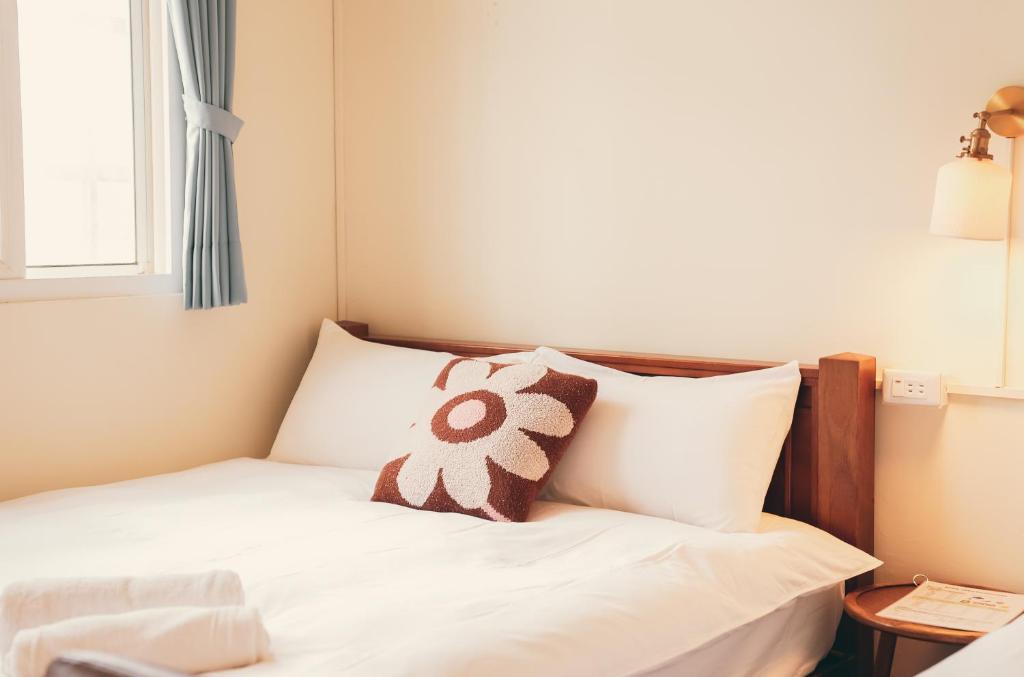 Rúm í herbergi á Juran B&B