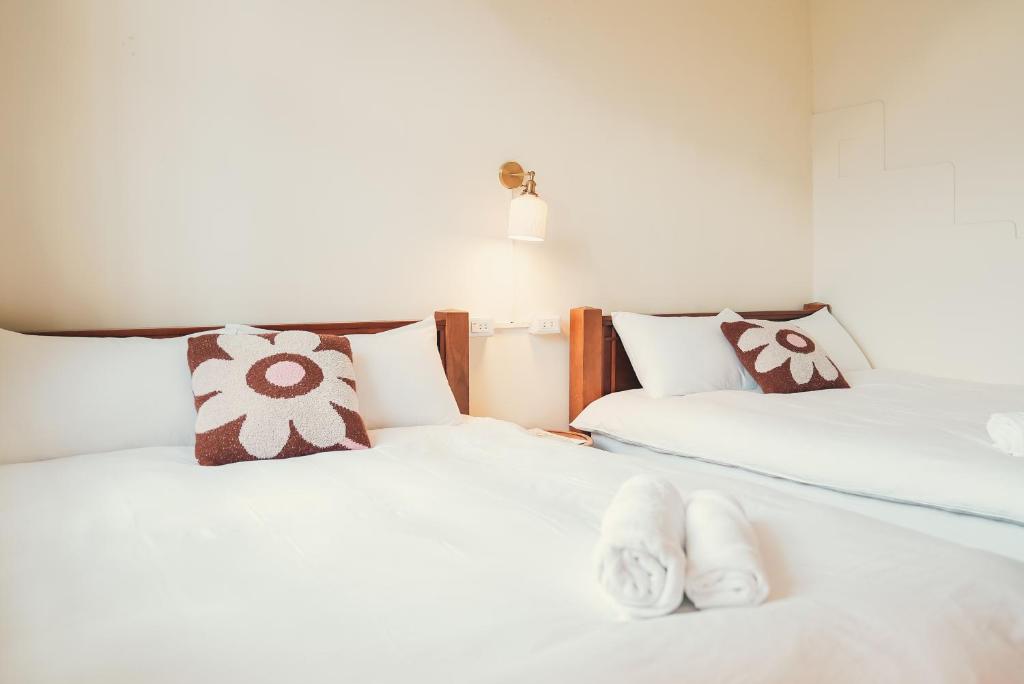 Rúm í herbergi á Juran B&B