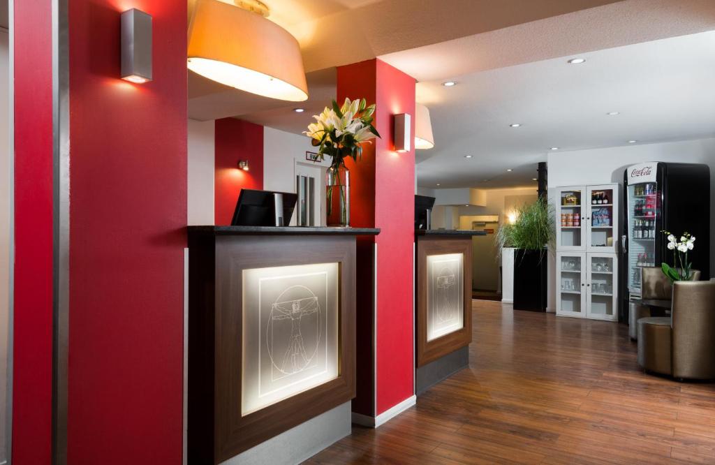 A cozinha ou cozinha compacta de Leonardo Hotel Frankfurt City Center