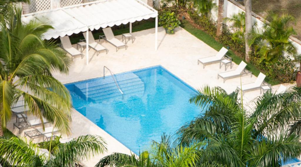 Bazén v ubytování Hotel Casa Hemingway nebo v jeho okolí