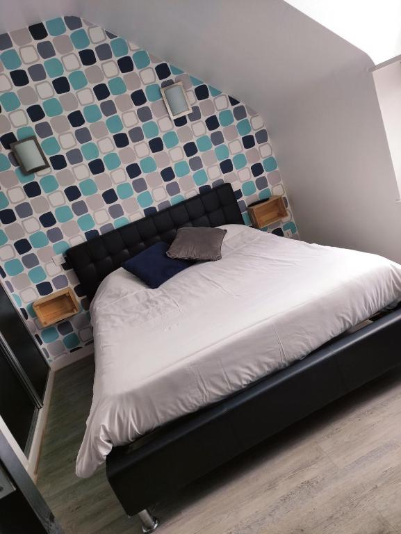Postel nebo postele na pokoji v ubytování Contact Hôtel de Matignon