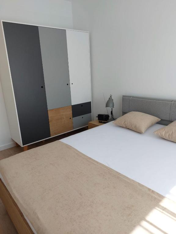 Posteľ alebo postele v izbe v ubytovaní Apartament "Kapitański"