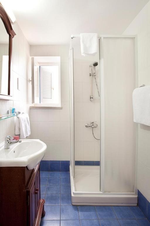 Koupelna v ubytování Alkisti City Hotel