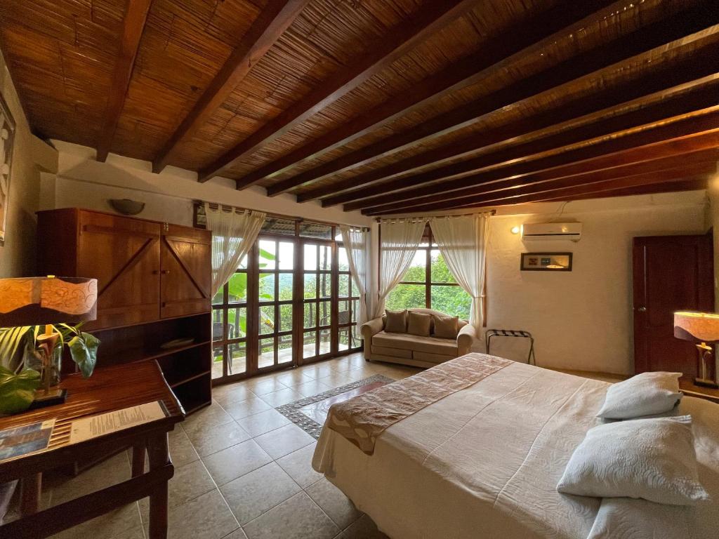 Postel nebo postele na pokoji v ubytování Samai Lodge Holistic Living