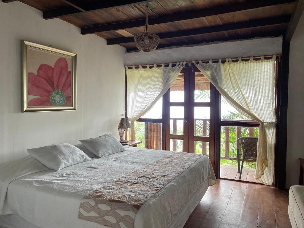 Postel nebo postele na pokoji v ubytování Samai Lodge Holistic Living