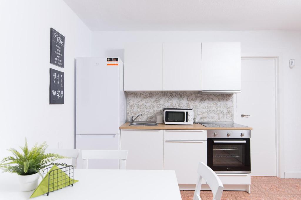 A kitchen or kitchenette at Sea View, Newly Renovated, 2 Bedrooms Apartment in Costa Adeje