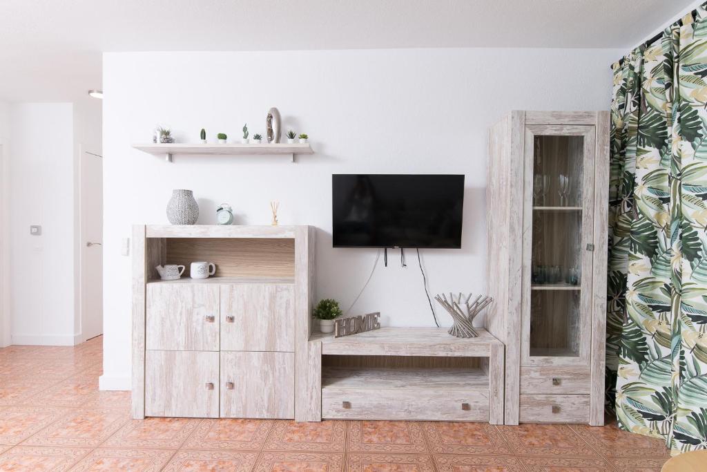 A television and/or entertainment centre at Sea View, Newly Renovated, 2 Bedrooms Apartment in Costa Adeje