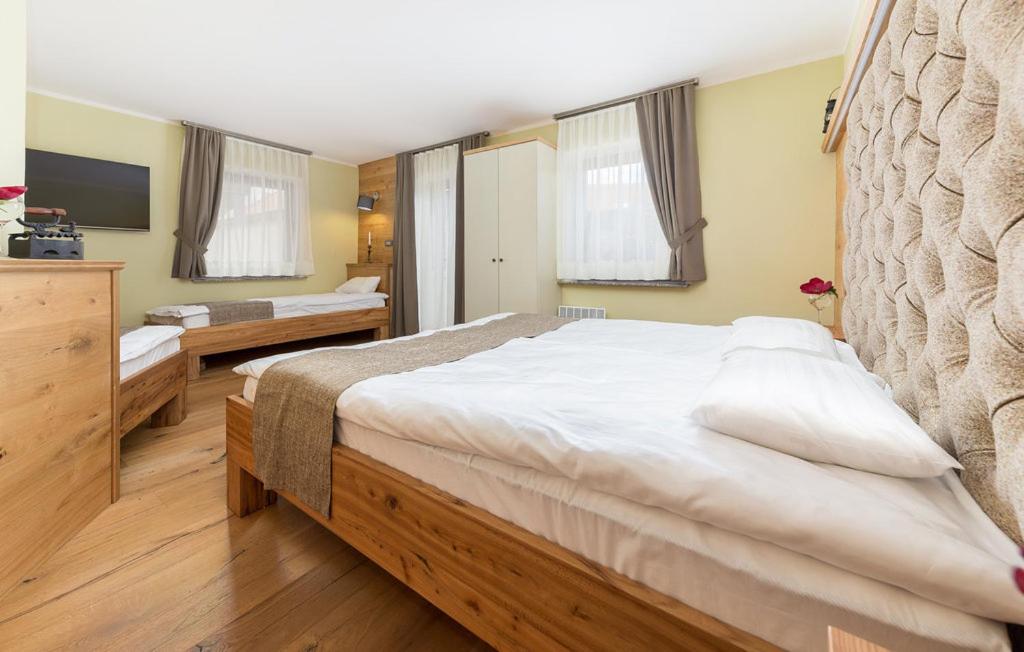 Postel nebo postele na pokoji v ubytování Apartma Rozika