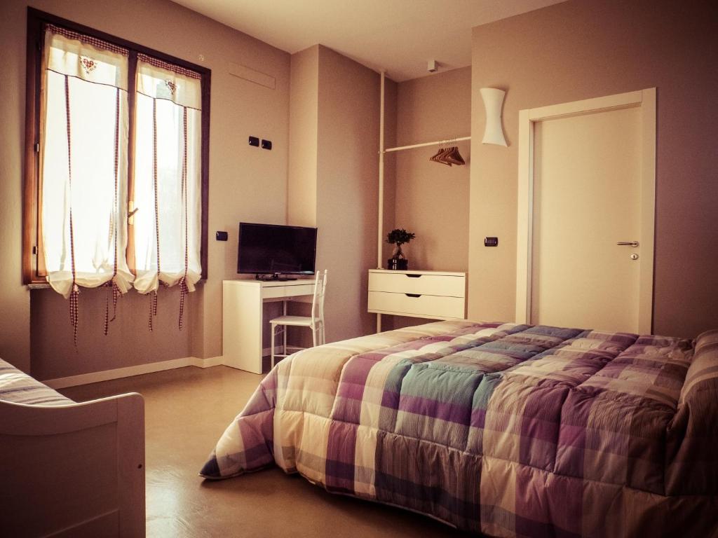TV a/nebo společenská místnost v ubytování B&B Aurora