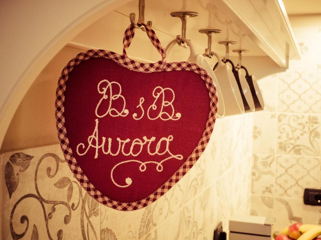 Certifikát, hodnocení, plakát nebo jiný dokument vystavený v ubytování B&B Aurora