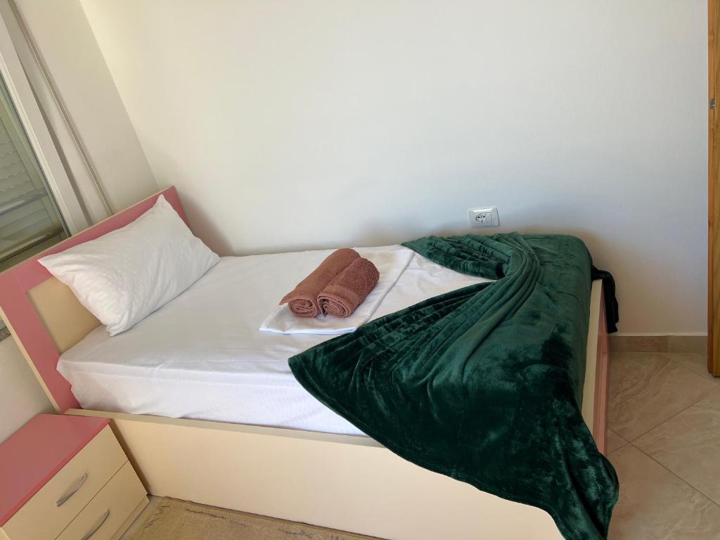 Postel nebo postele na pokoji v ubytování Sol Apartment