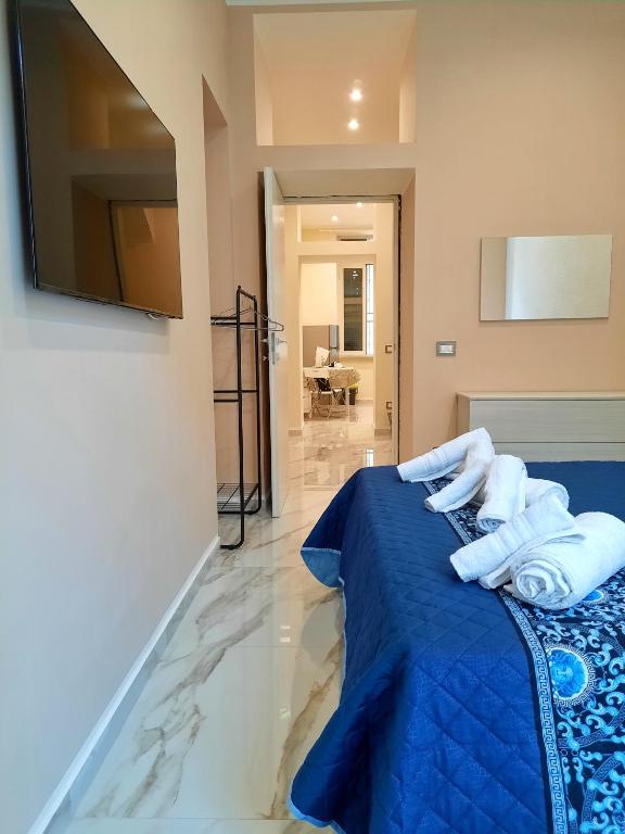 Posteľ alebo postele v izbe v ubytovaní Re Ferdinando Apartment